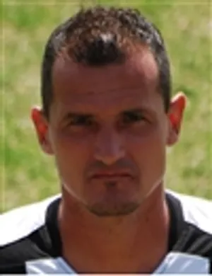 T. Szamosi
